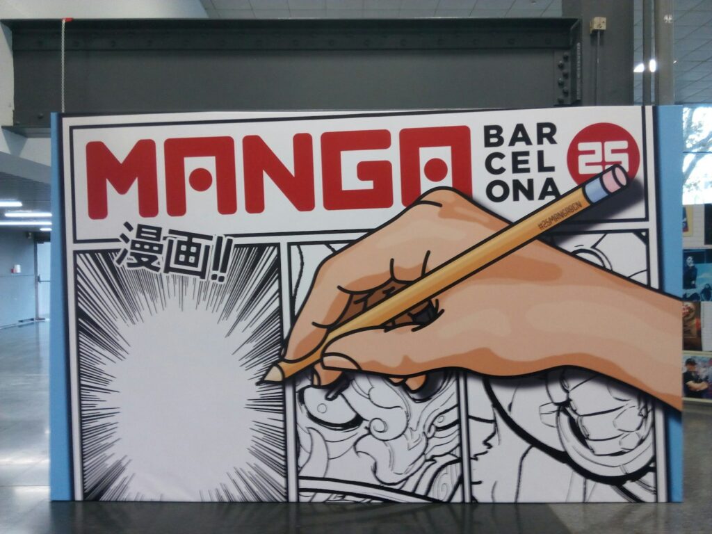 A hand writing on a sign with a pencil