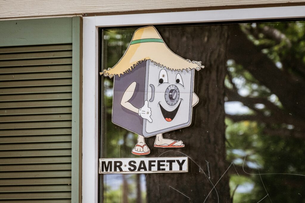 white and black wooden signage